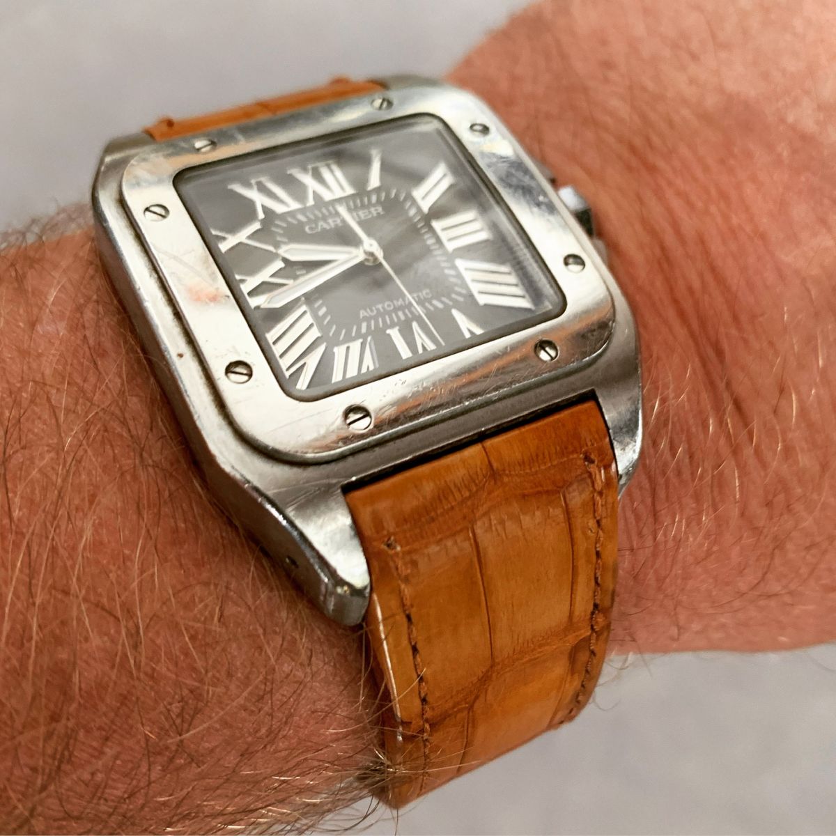 Cartier Santos 100 XL style strap in Amber Brown Alligator leather. Integrated